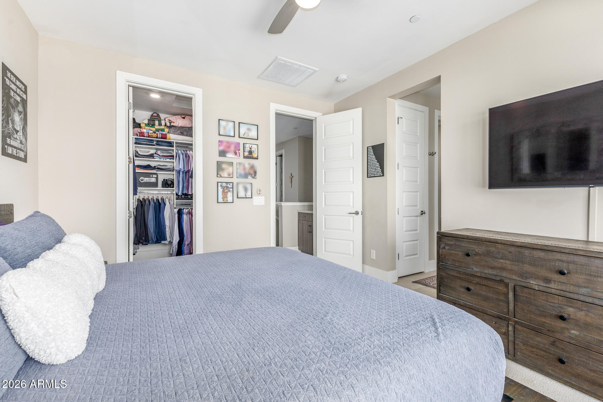 6850 East McDowell Road, Unit 71 Scottsdale, AZ 85257 - Photo 15 of 36 a bedroom with a bed and a television
