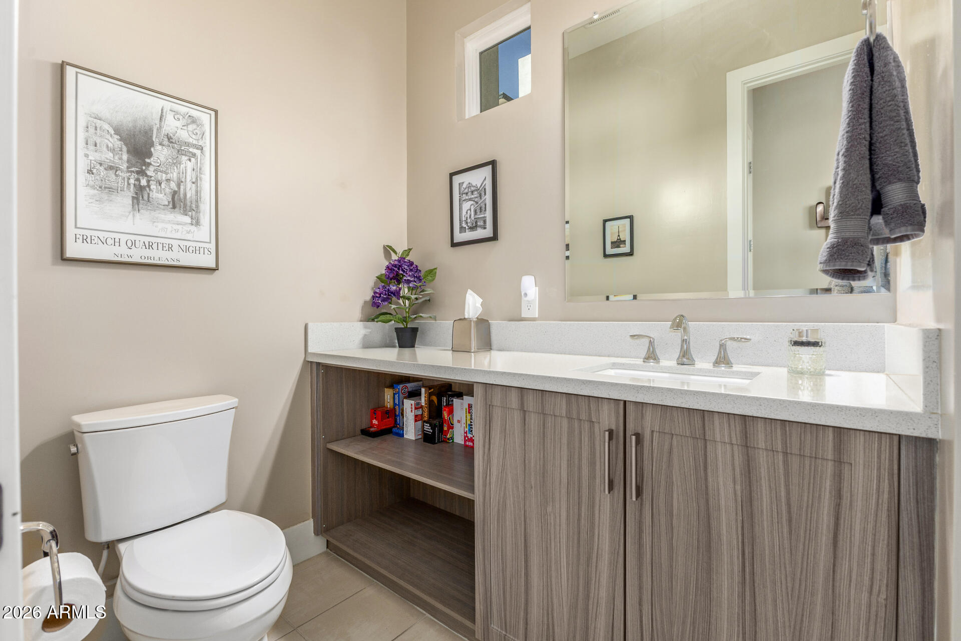 6850 East McDowell Road, Unit 71 Scottsdale, AZ 85257 - Photo 24 of 36 a bathroom with a toilet sink and a mirror