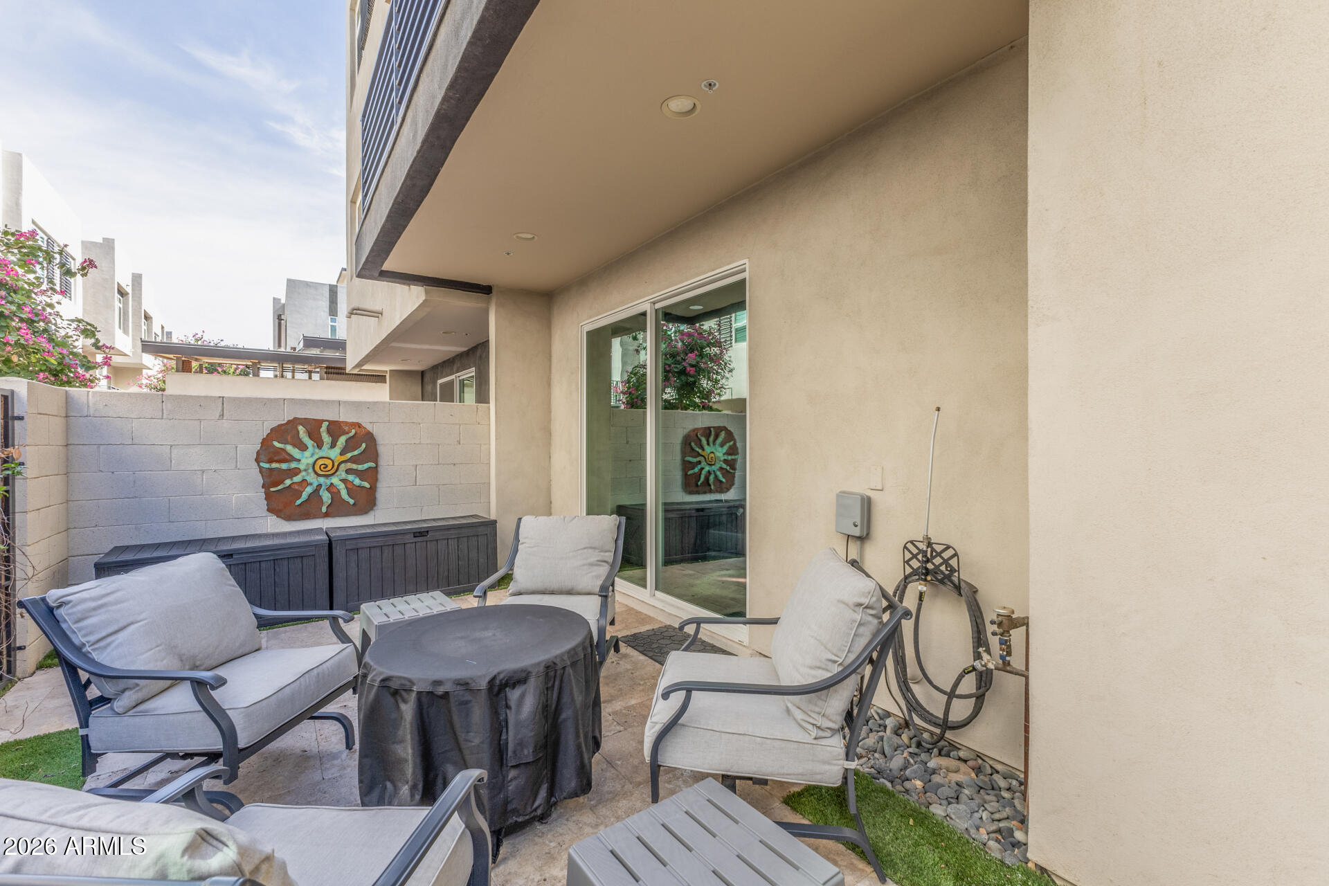 6850 East McDowell Road, Unit 71 Scottsdale, AZ 85257 - Photo 29 of 36 a view of a chairs and table in a balcony