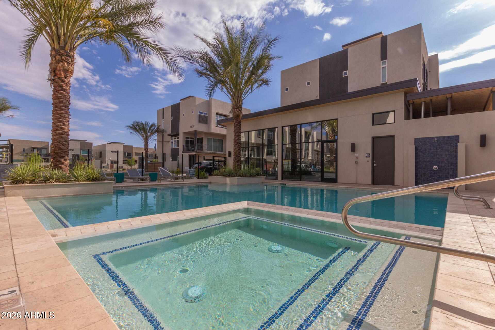6850 East McDowell Road, Unit 71 Scottsdale, AZ 85257 - Photo 32 of 36 a view of a pool with a patio