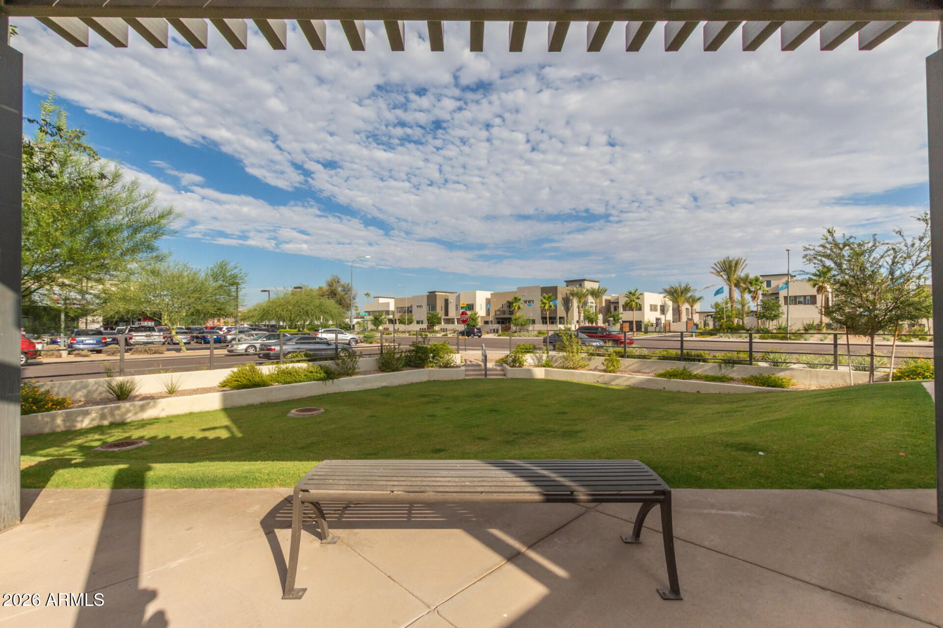6850 East McDowell Road, Unit 71 Scottsdale, AZ 85257 - Photo 35 of 36 a view of swimming pool and outdoor seating