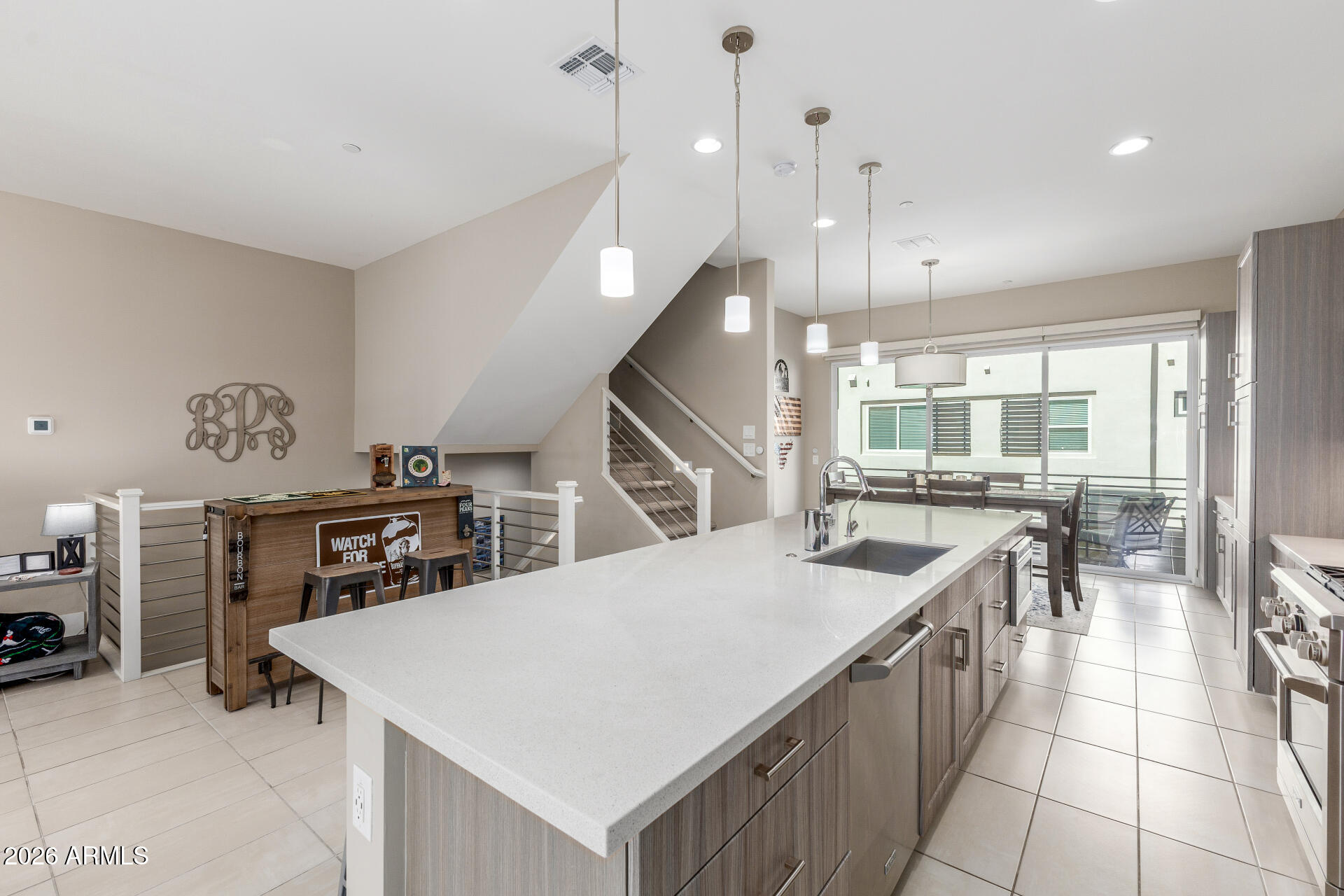 6850 East McDowell Road, Unit 71 Scottsdale, AZ 85257 - Photo 4 of 36 a kitchen with counter top space and appliances