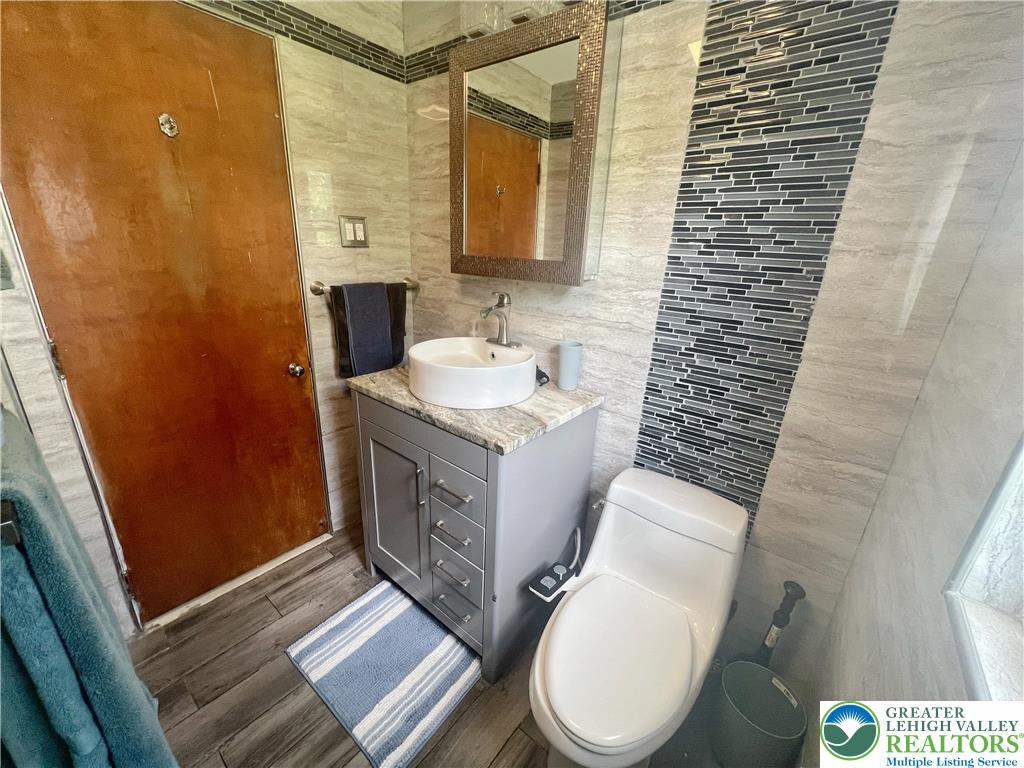 1345 Macada Road Bethlehem, PA 18017 - Photo 9 of 23 a bathroom with a sink and a toilet