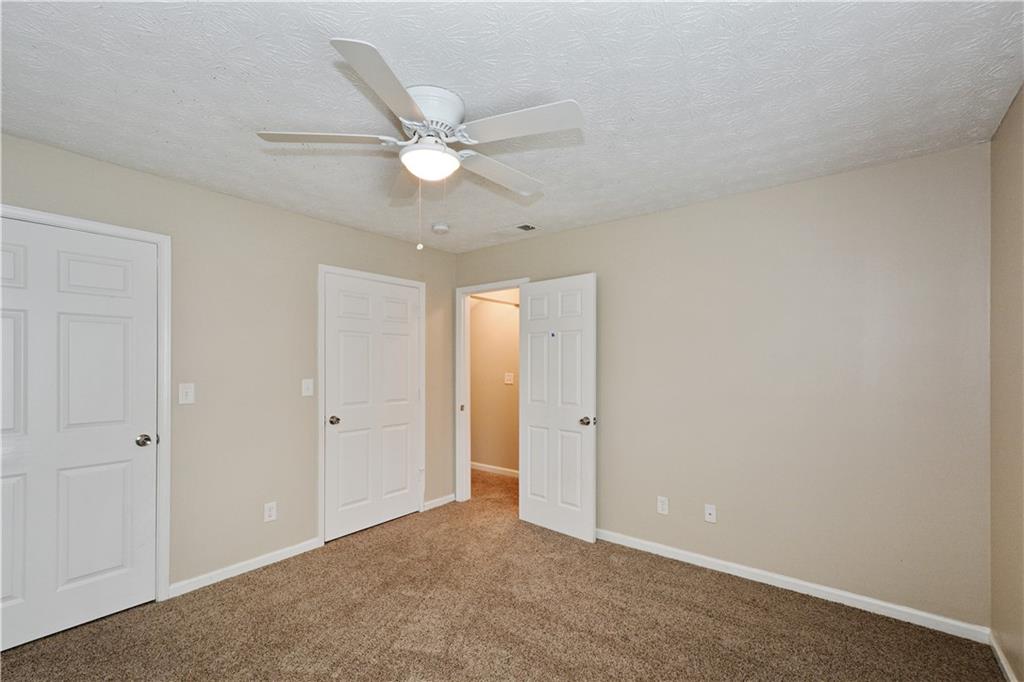 Undisclosed Address Conyers, GA 30013 - Photo 19 of 24 a view of an empty room