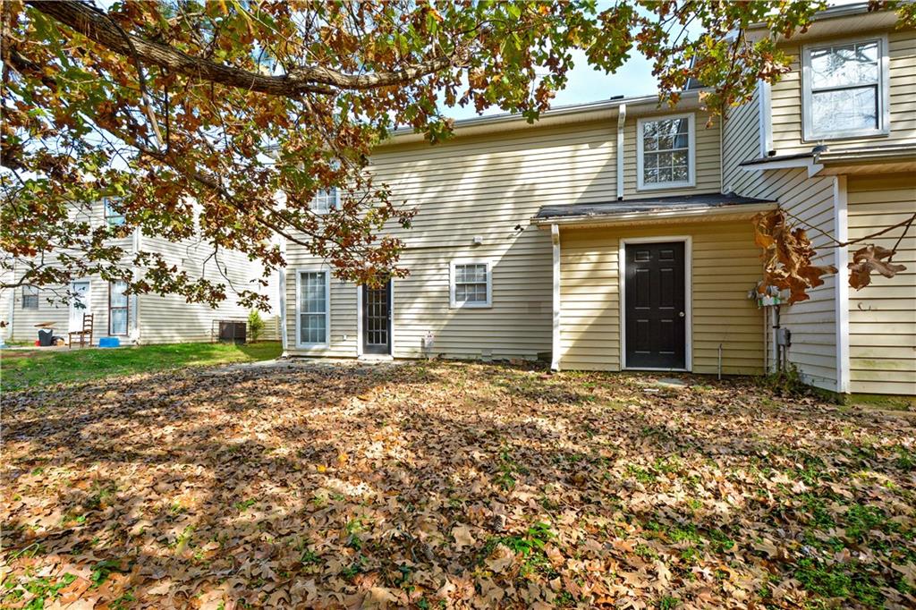 Undisclosed Address Conyers, GA 30013 - Photo 24 of 24 a view of a house with a yard