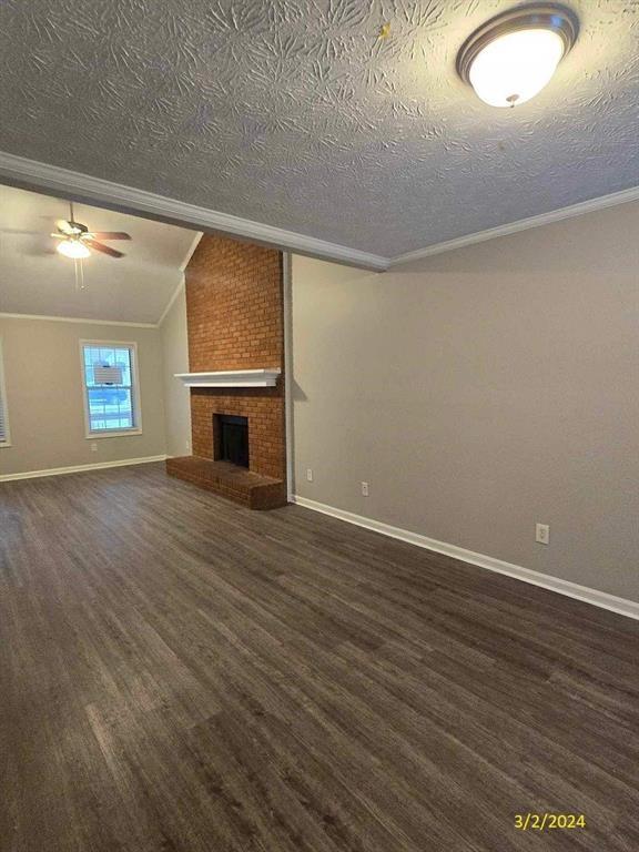 Undisclosed Address Conyers, GA 30013 - Photo 5 of 24 an empty room with wooden floor fan and windows