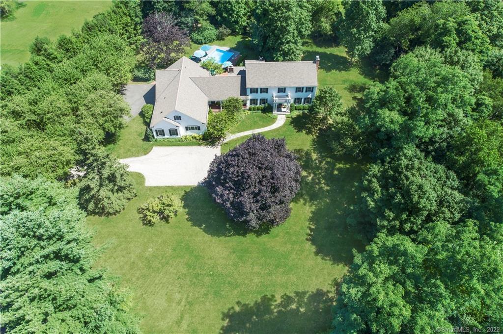 190 Nod Road Ridgefield, CT 06877 - Photo 1 of 1 a view of a house with a yard and large trees