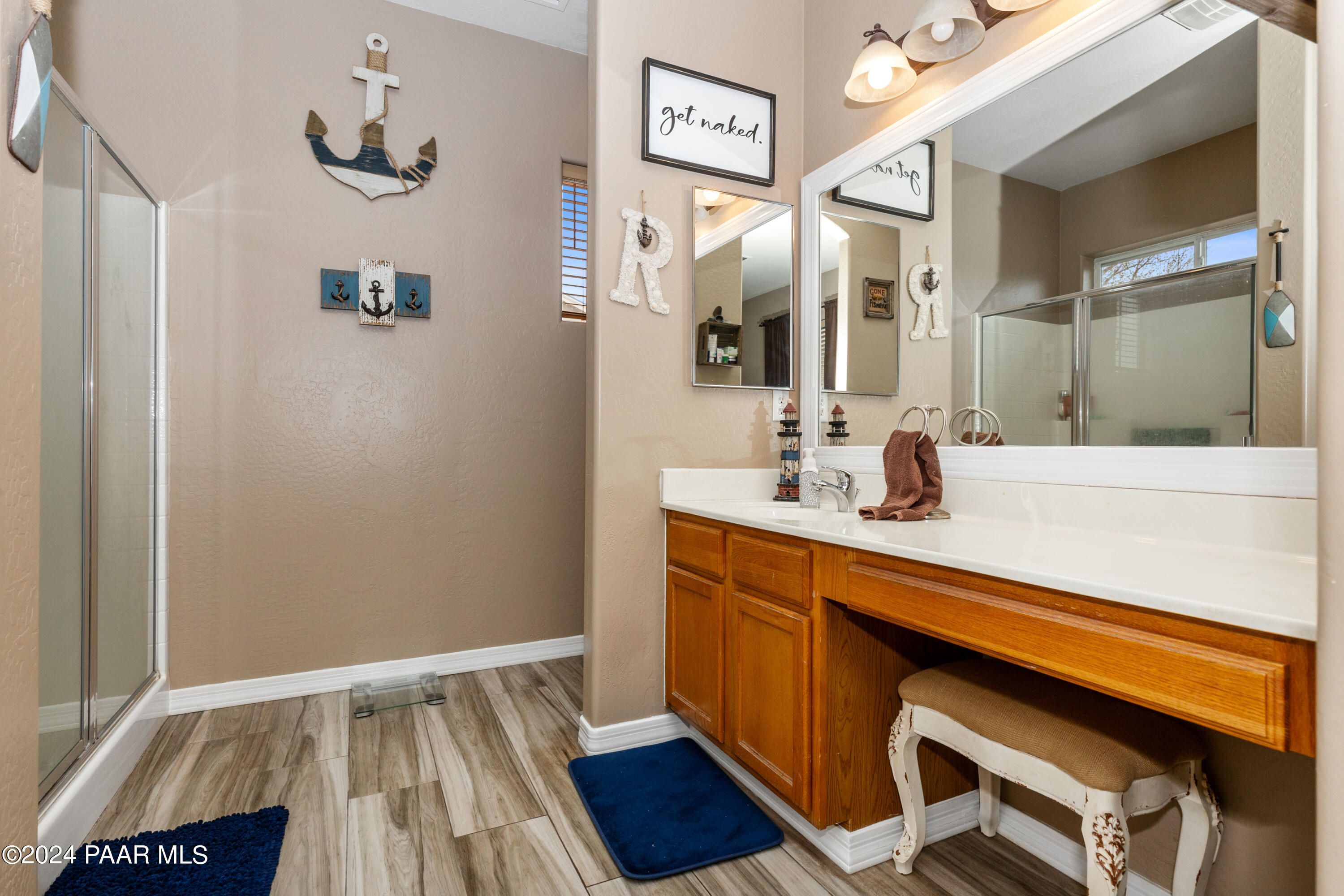 7753 Melody Ranch Road Prescott Valley, AZ 86315 - Photo 12 of 42 a bathroom with a sink and a mirror