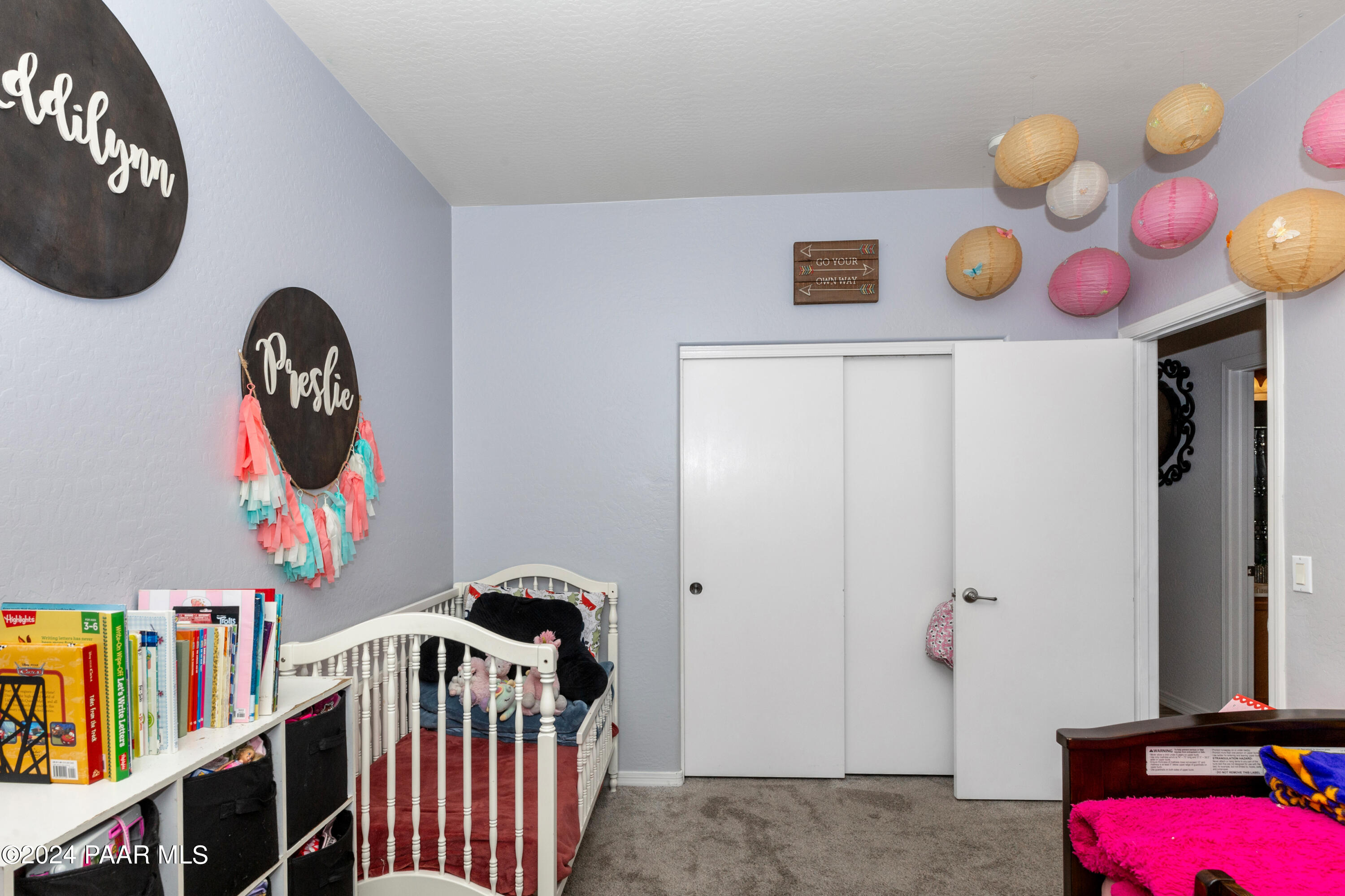 7753 Melody Ranch Road Prescott Valley, AZ 86315 - Photo 16 of 42 a front view of a house with lots of stuff