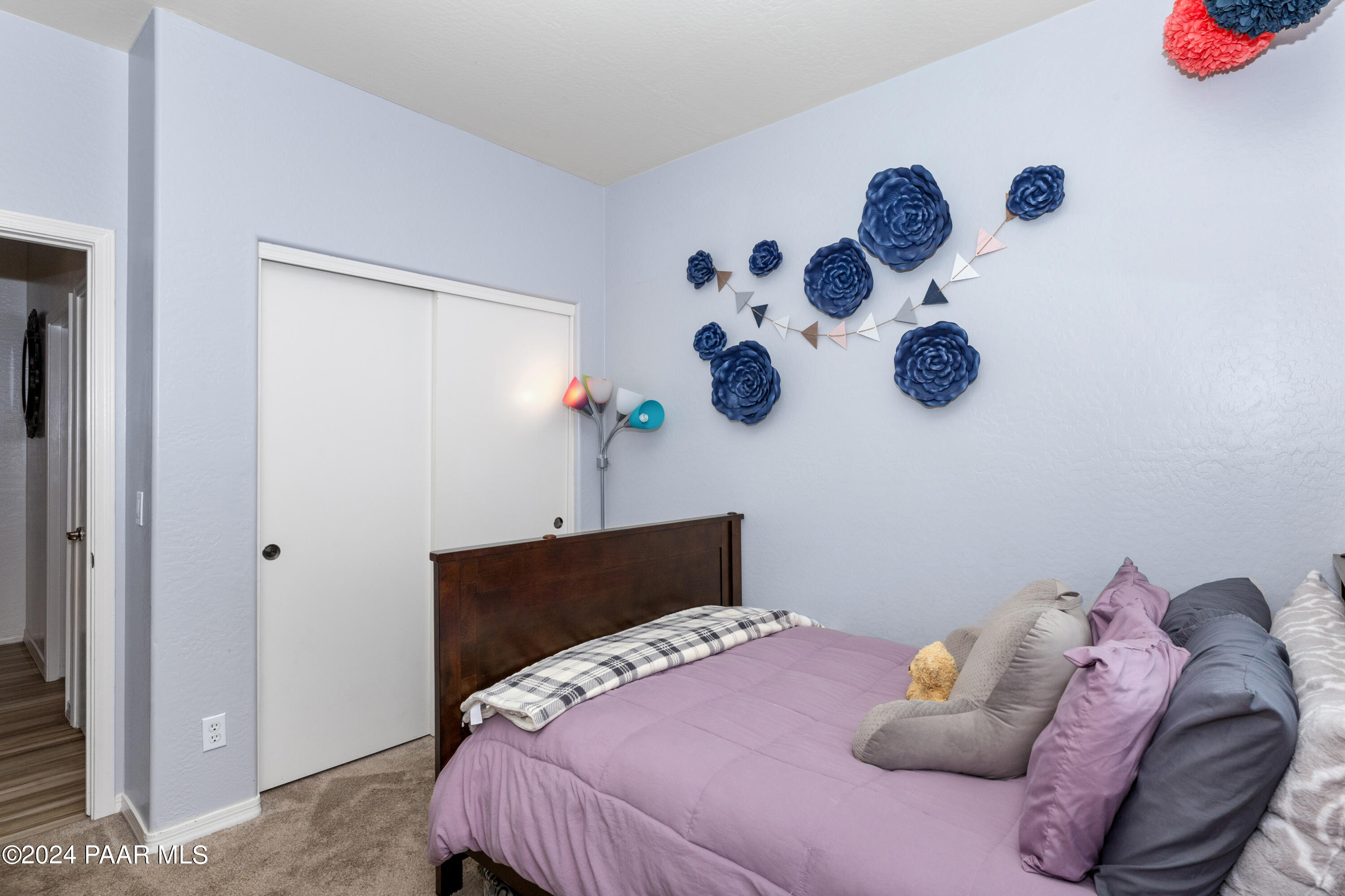 7753 Melody Ranch Road Prescott Valley, AZ 86315 - Photo 19 of 42 a bedroom with a bed and cabinets