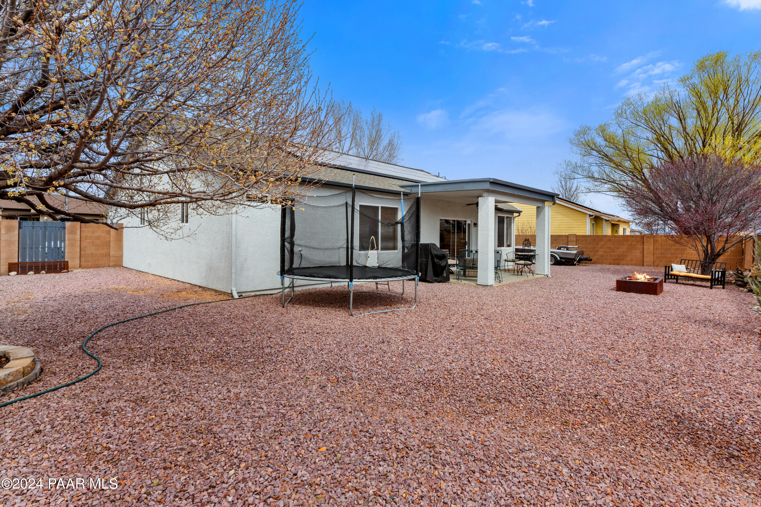 7753 Melody Ranch Road Prescott Valley, AZ 86315 - Photo 21 of 42 a view of a house with a yard