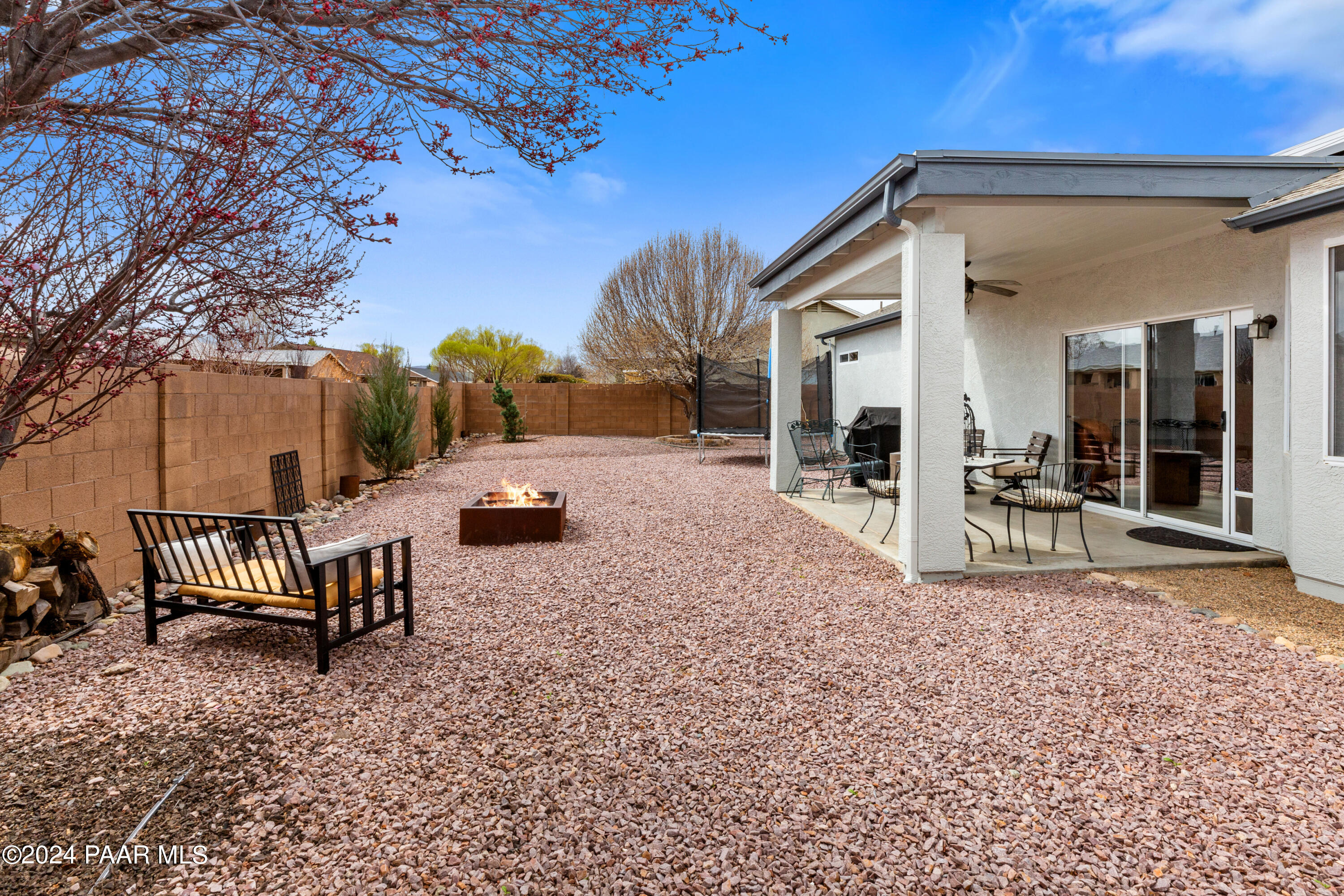 7753 Melody Ranch Road Prescott Valley, AZ 86315 - Photo 24 of 42 a view of a house with backyard and furniture
