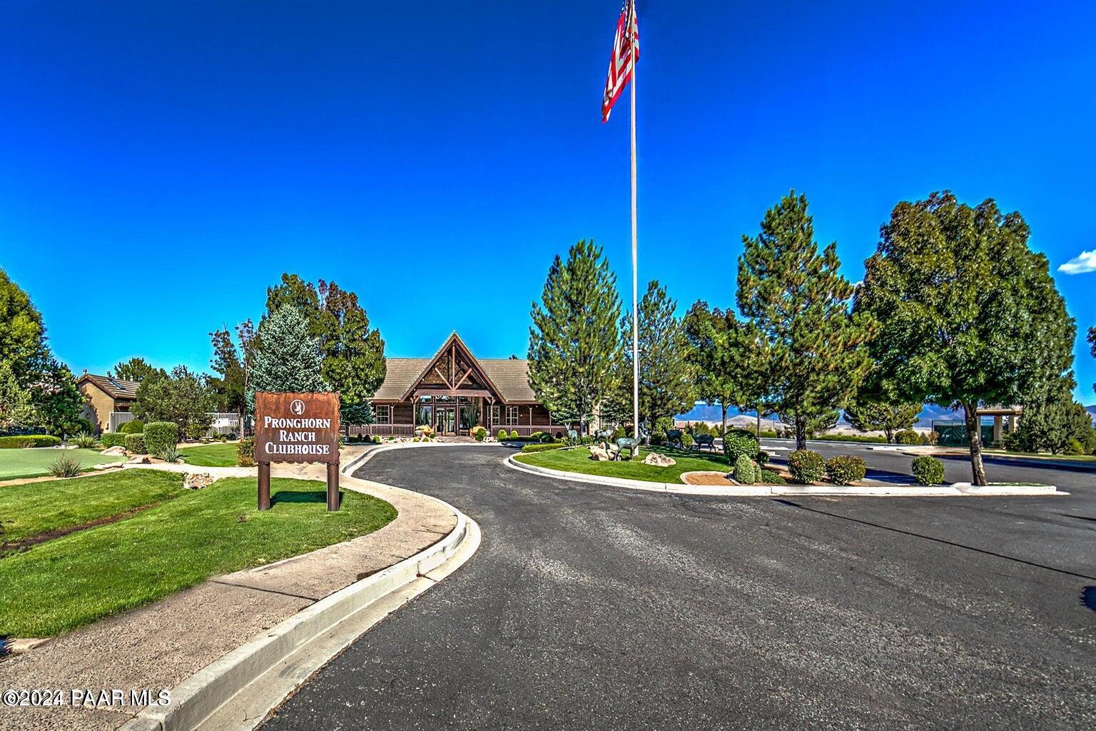 7753 Melody Ranch Road Prescott Valley, AZ 86315 - Photo 27 of 42 a view of a house with a yard and street