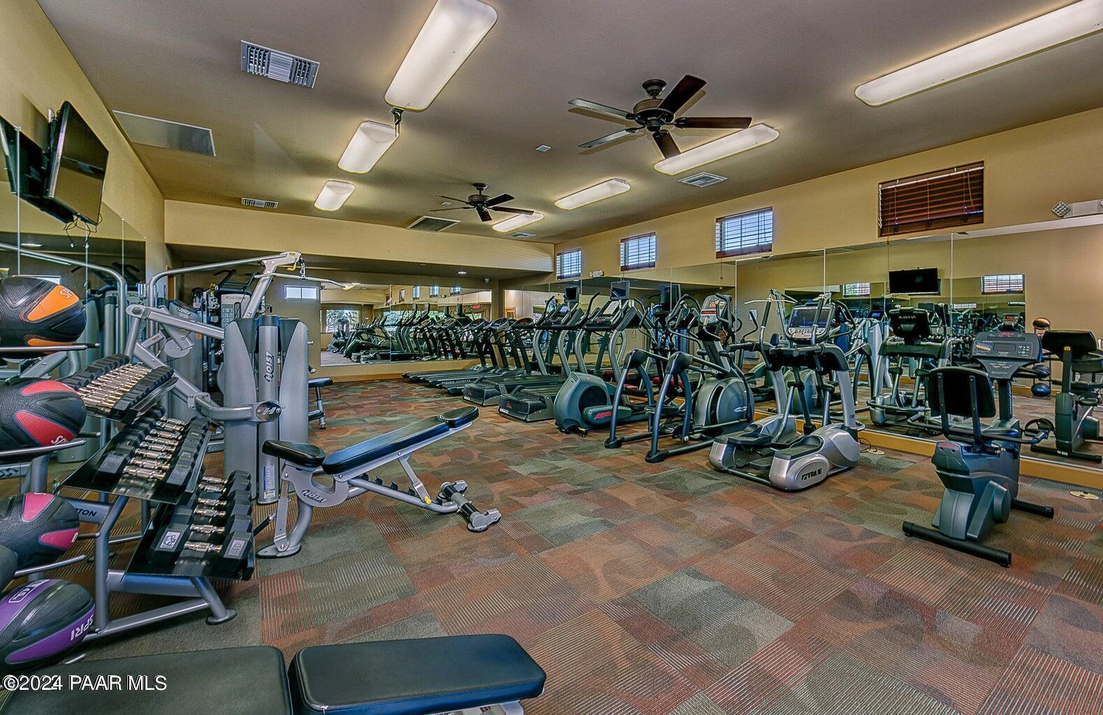 7753 Melody Ranch Road Prescott Valley, AZ 86315 - Photo 32 of 42 a view of a room with gym equipment