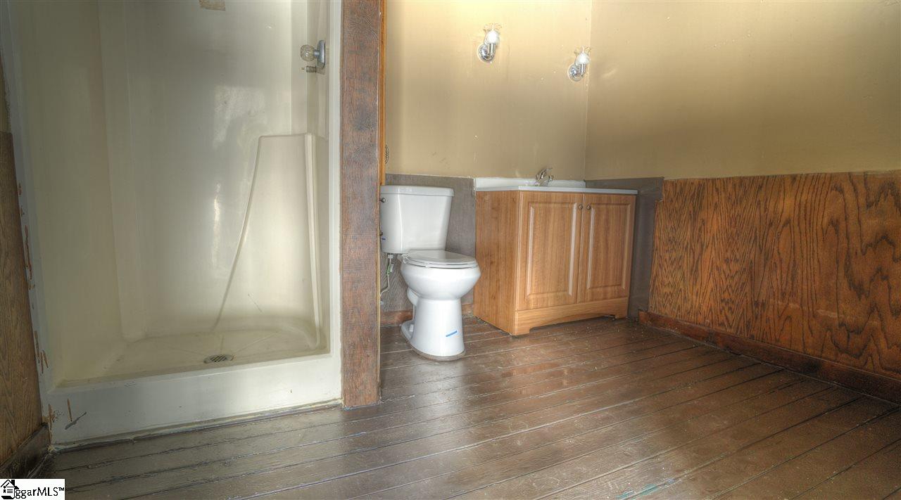 2305 East Lee Road Taylors, SC 29687 - Photo 22 of 27 Poolhouse with shower, toilet and sink area
