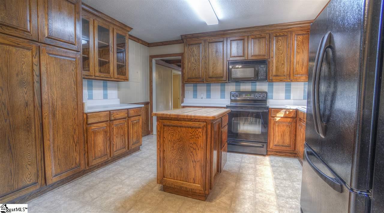 2305 East Lee Road Taylors, SC 29687 - Photo 6 of 27 The island is mobile so you can refigure to your chef's preference
