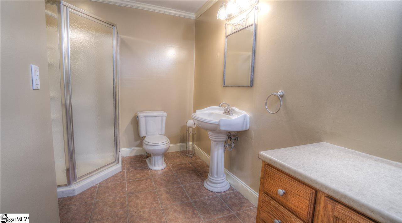 2305 East Lee Road Taylors, SC 29687 - Photo 10 of 27 Stand up shower, pedestal sink and separate vanity area makes mornings less chaotic.