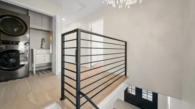 a view of a storage & utility room with washer and dryer