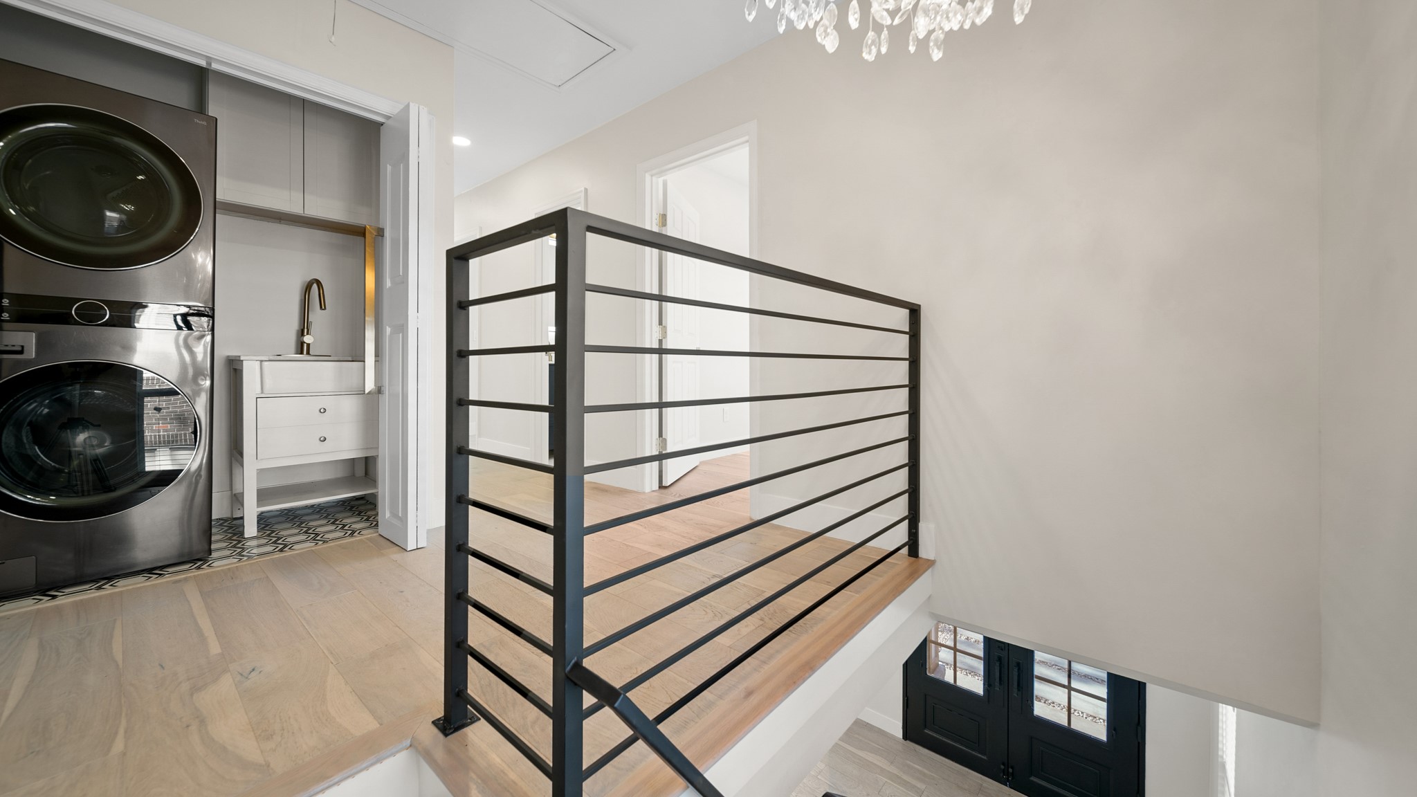 2119 Isabella Street Houston, TX 77004 - Photo 14 of 23 a view of a storage & utility room with washer and dryer