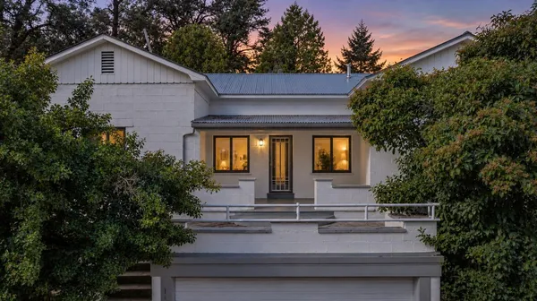 a view of house with a outdoor space