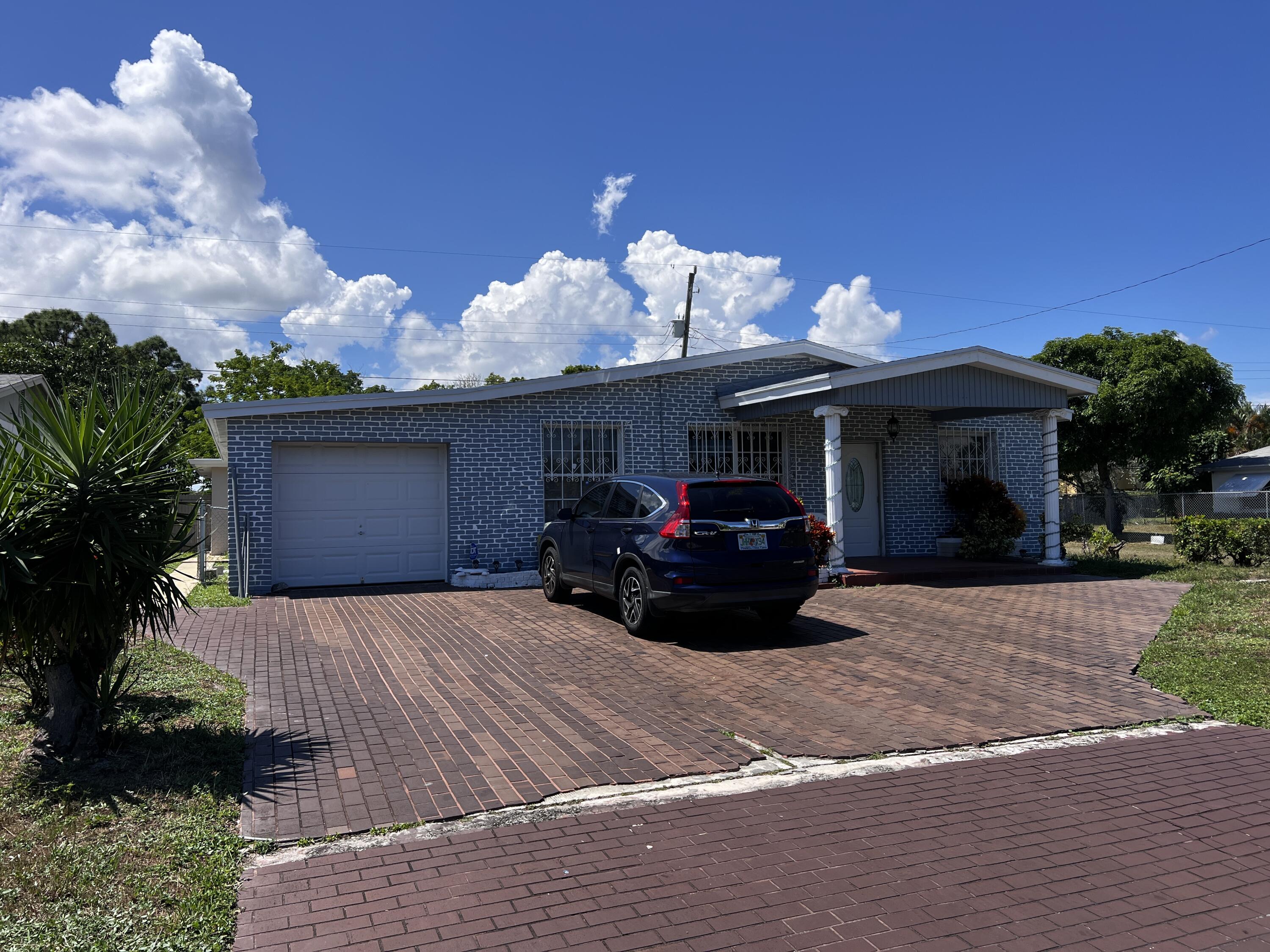 3029 Avenue T Riviera Beach, FL 33404 - Photo 1 of 32 IMG_7211