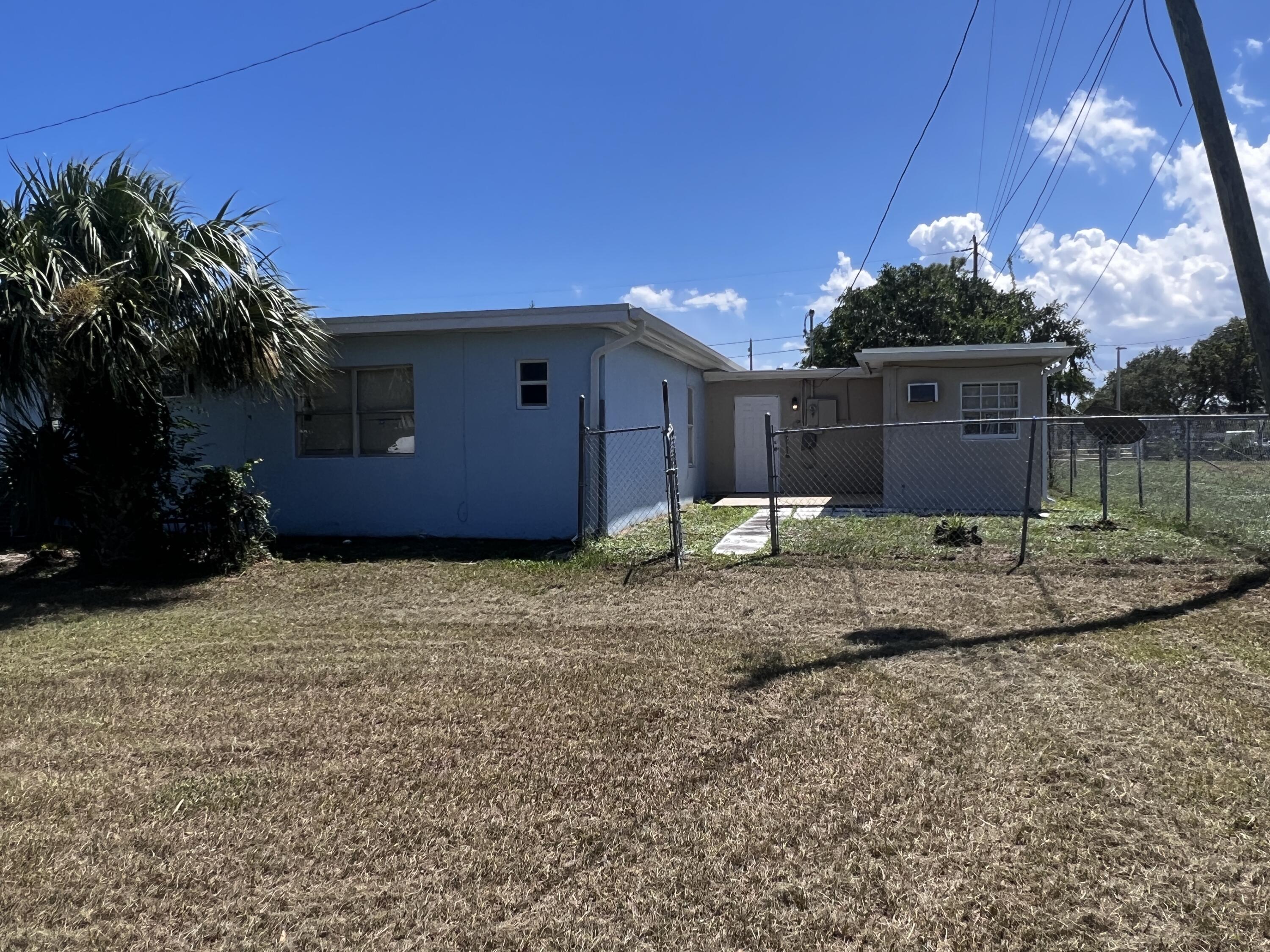 3029 Avenue T Riviera Beach, FL 33404 - Photo 2 of 32 IMG_7215