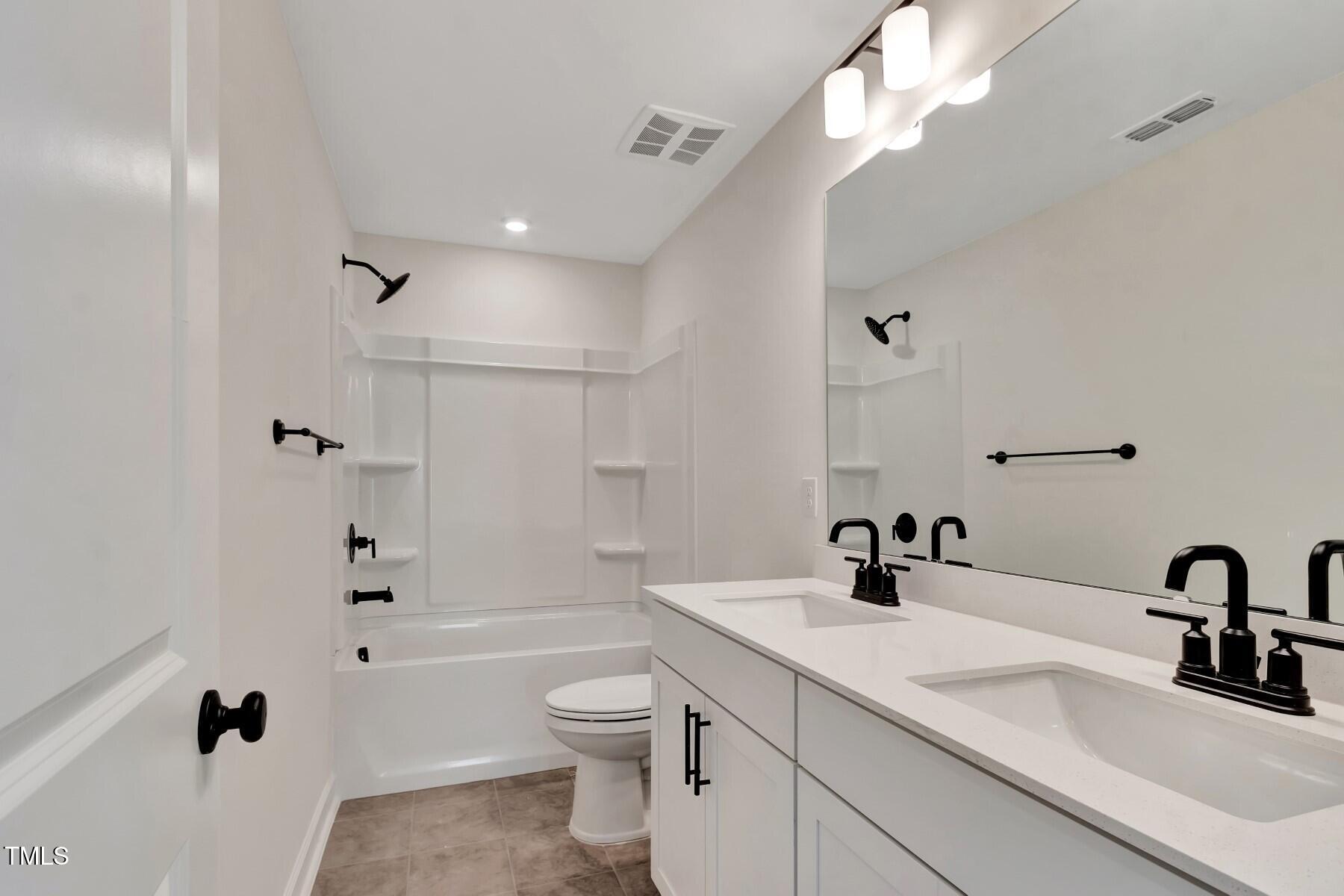 4413 Gehrig Lane, Unit 19 Raleigh, NC 27616 - Photo 32 of 38 2nd Floor Hall Bath