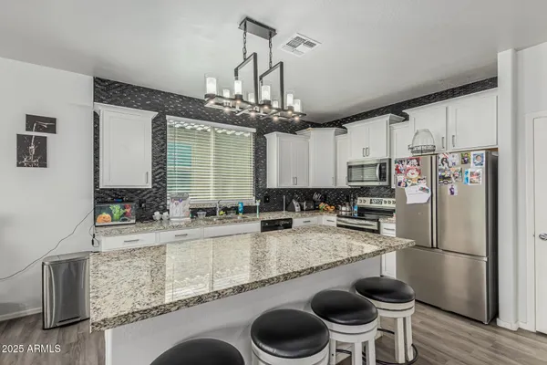 $410,000 | 21561 West Ashleigh Marie Drive, Buckeye, AZ 85326