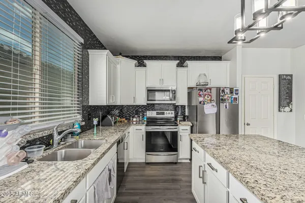 $410,000 | 21561 West Ashleigh Marie Drive, Buckeye, AZ 85326