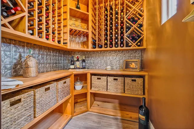 a spacious bathroom with a sink double vanity and a mirror