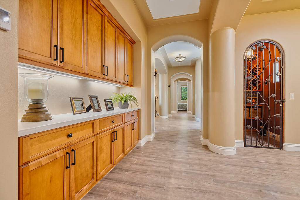 35202 Vista Del Monte Rancho Mirage, CA 92270 - Photo 20 of 35 a view of entryway and hall with wooden floor