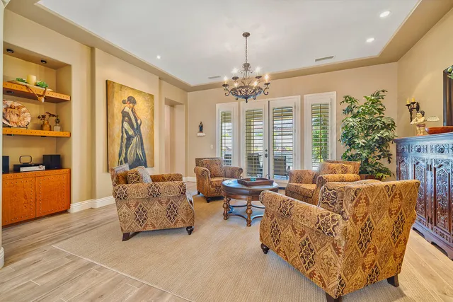 a view of swimming pool with outdoor seating