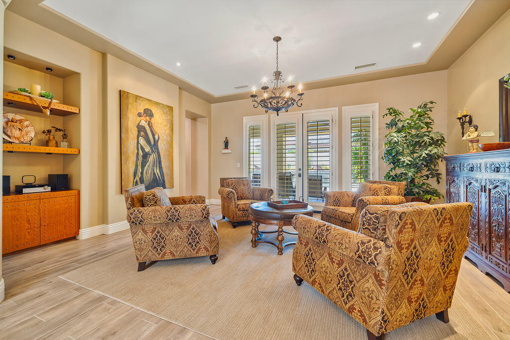 35202 Vista Del Monte Rancho Mirage, CA 92270 - Photo 21 of 35 a living room with furniture and a chandelier
