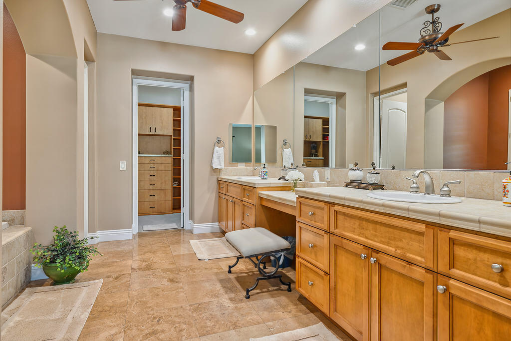 35202 Vista Del Monte Rancho Mirage, CA 92270 - Photo 28 of 35 a spacious bathroom with a sink double vanity and a mirror