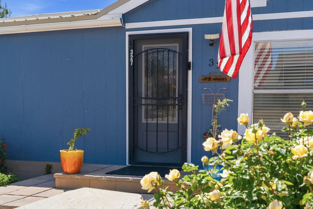 327 North Lodge Road Central, UT 84722 - Photo 3 of 45 Blue exterior siding with white trim