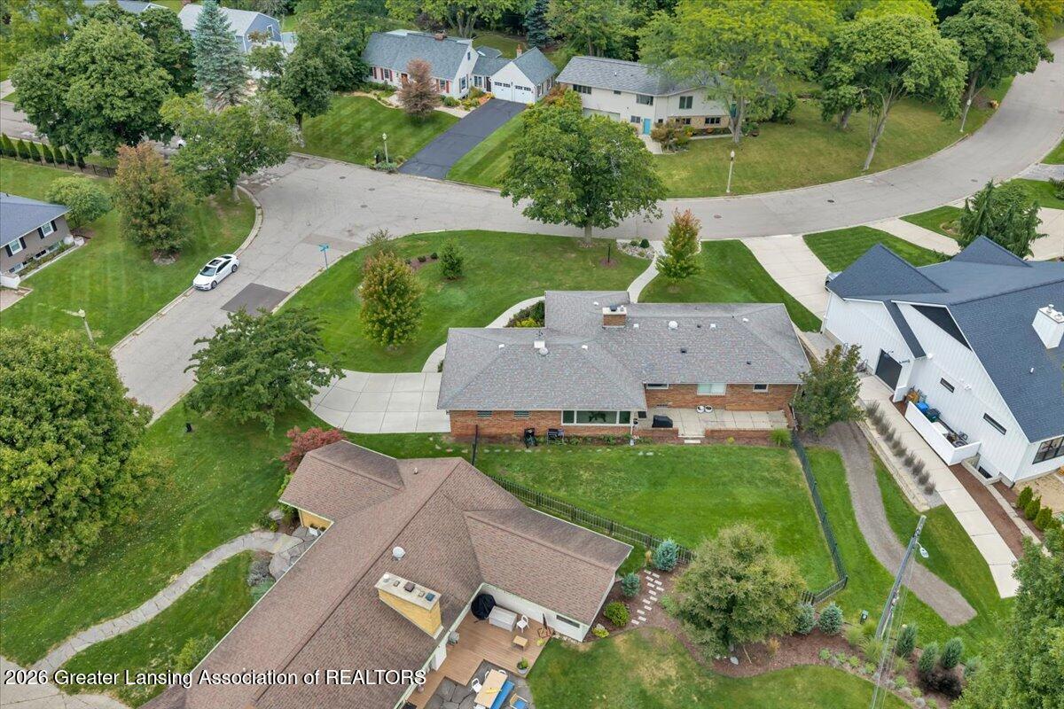 1533 Cambridge Road Lansing, MI 48911 - Photo 24 of 36 23-DJI_20260916155427_0066_D_ADNPHOTOGR