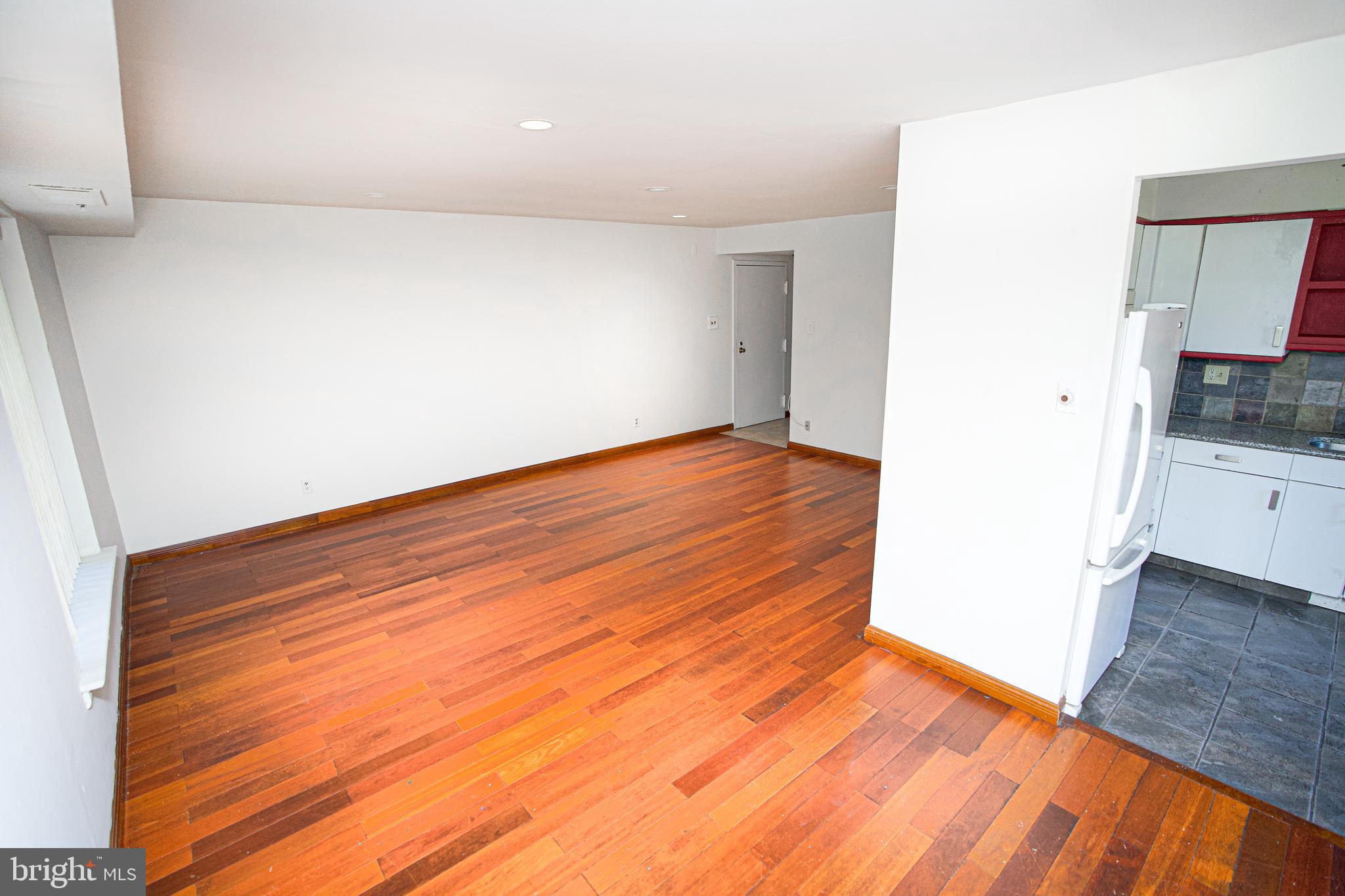 4000 Gypsy Lane, Unit 110C Philadelphia, PA 19129 - Photo 10 of 25 a view of a room with wooden floor and a sink