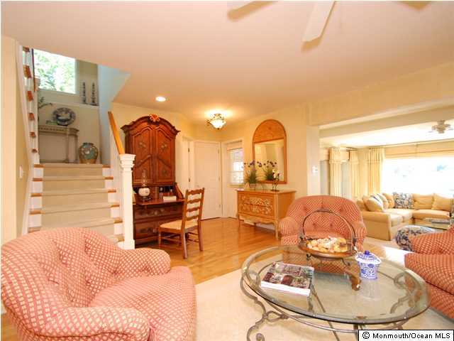 3723 River Road, Unit C Point Pleasant, NJ 08742 - Photo 8 of 13 a living room with furniture and a large window