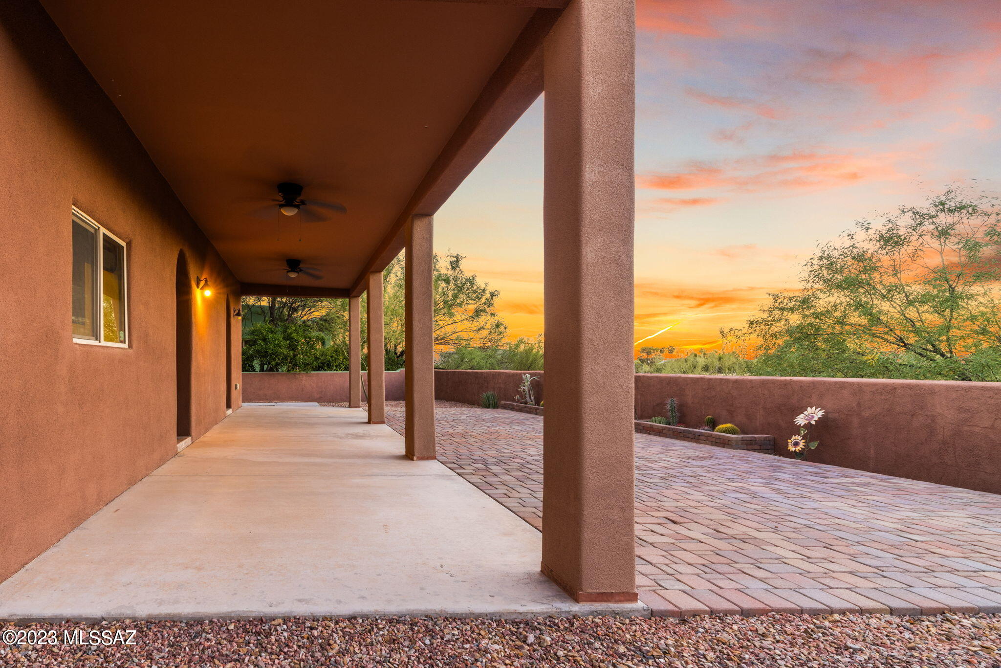 5670 Triangle X Place Tucson, AZ 85713 - Photo 30 of 36 a view of a floor to ceiling window with an outdoor space