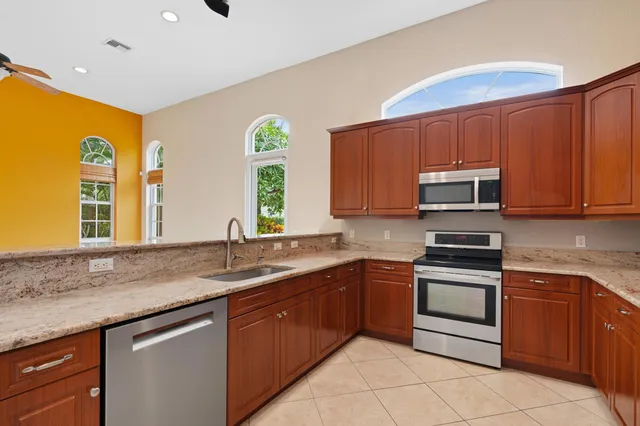 $990,000 | 7348 East Country Club Boulevard, Boca Raton, FL 33487