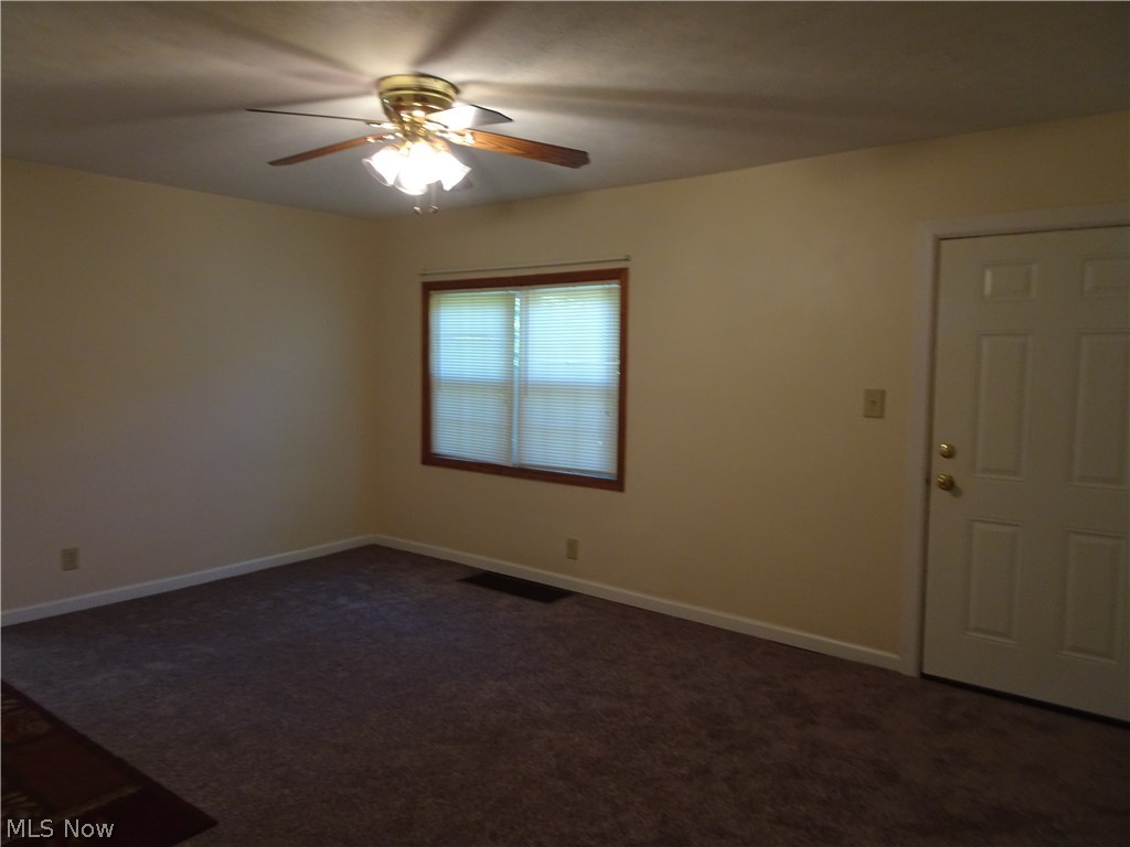 3265 Cottage Grove Road Akron, OH 44319 - Photo 7 of 21 Huge living room off of kitchen and dining room area.
