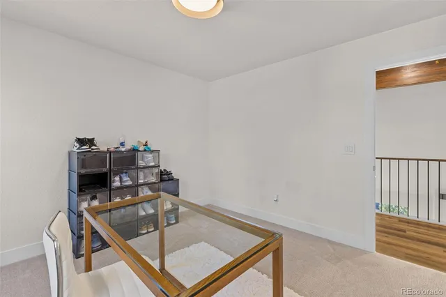 a view of a room with racks on the wall