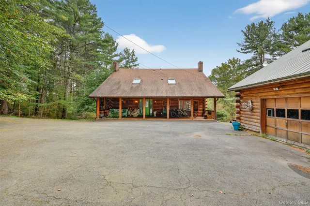 a view of a house with a outdoor space and street view