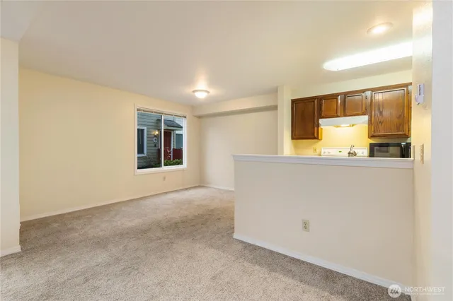 an empty room with a windows