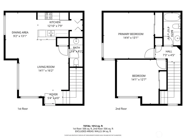 a picture of a bench in front of a wall