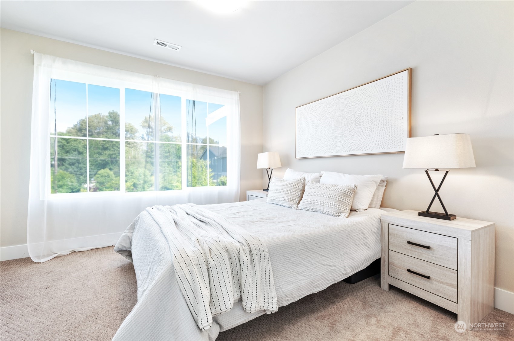 17639 115th Place Southeast Renton, WA 98055 - Photo 15 of 25 a bedroom with a bed and a window