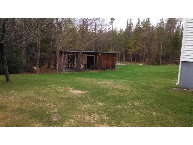 13 Attean Road Jackman, ME 04945 - Photo 3 of 11 Back Yard. Nice back yard with wood shed