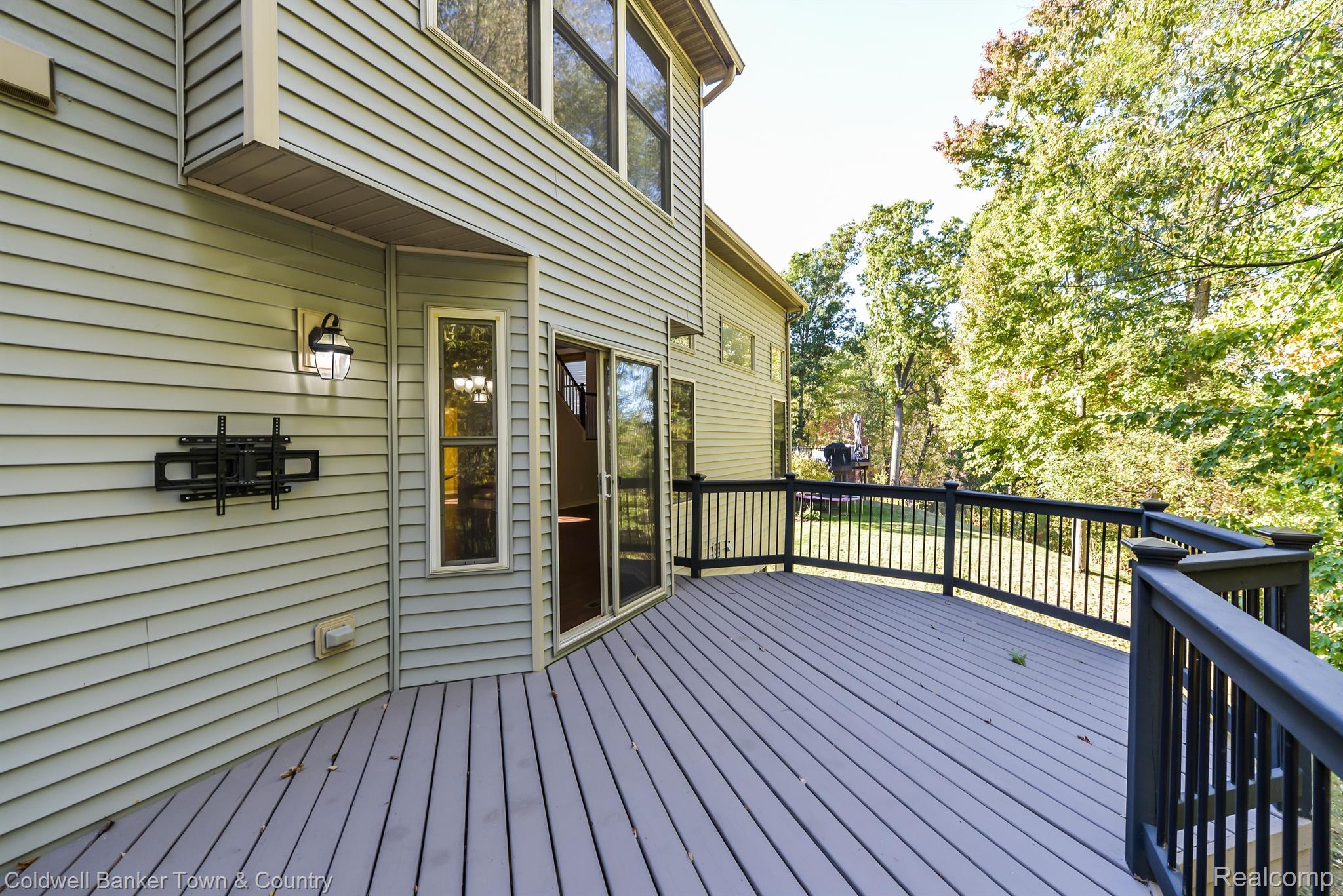 213 Slider Avenue Howell, MI 48843 - Photo 32 of 64 Large deck for entertaining