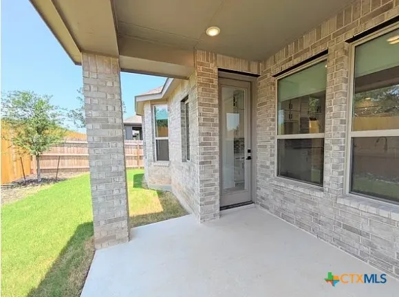 a view of an entryway of the house and outdoor space