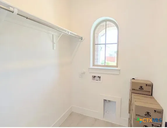a view of a room that has a window in it